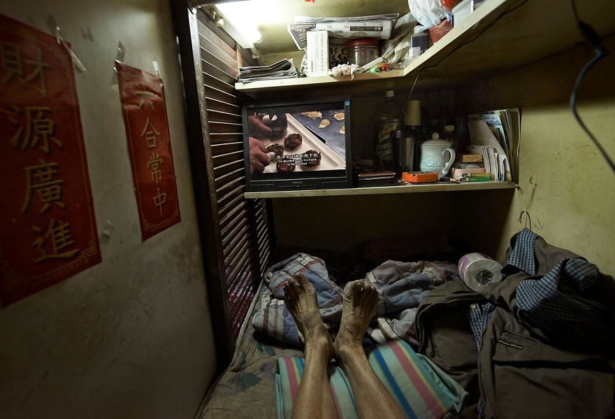 Illustration de l'article : 14 photos choc montrant la vie des habitants des « appartements cercueil » à Hong Kong